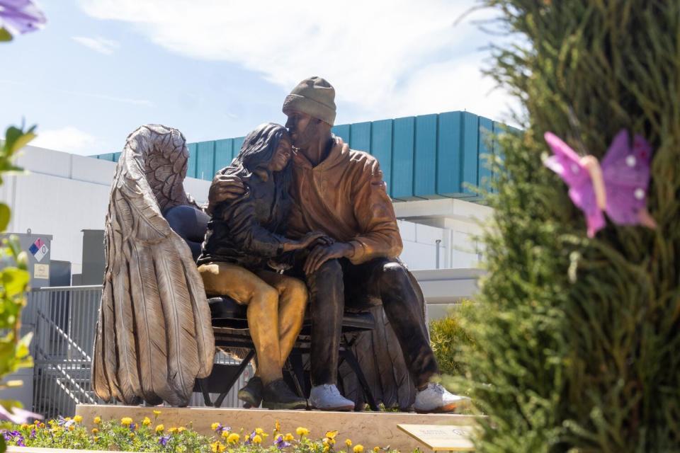 Kobe Bryant and Gianna Bryant Relax Near Entrance of Crypto.com Arena Honoring Lakers Legend